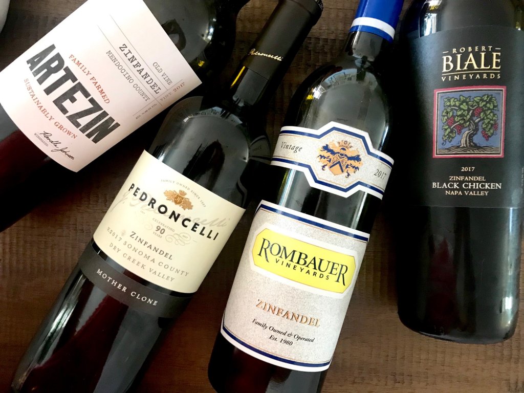 Four bottles of Zinfandel wine